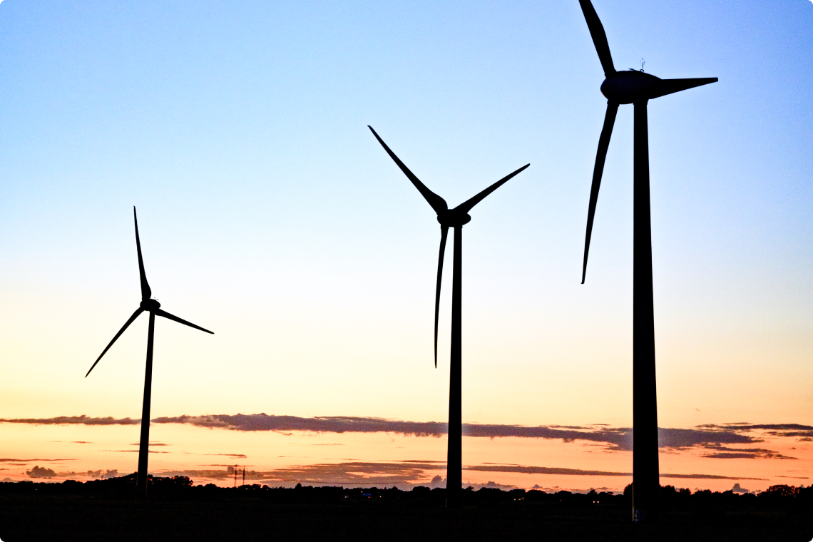 Three wind turbines in Sweden sunset